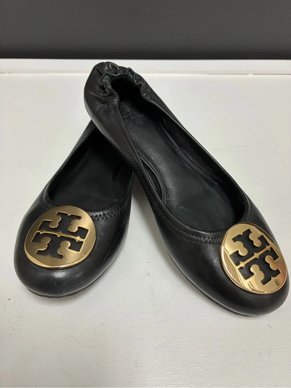Tory Burch Black Leather Logo Ballet Flats with Gold Emblem